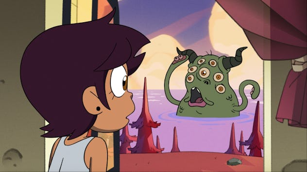 Luz gazes out at a monster in the Boiling Isles.