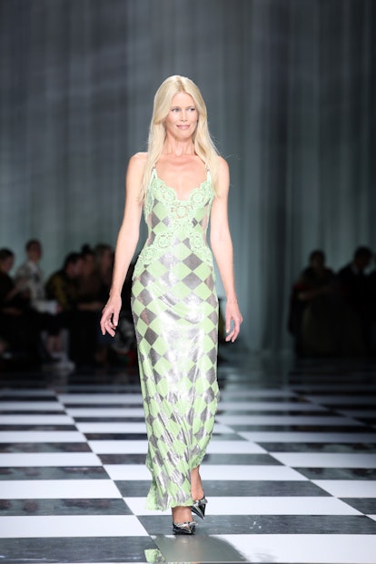  Claudia Schiffer walks the runway at the Versace fashion show during the Milan Fashion Week Womensw...