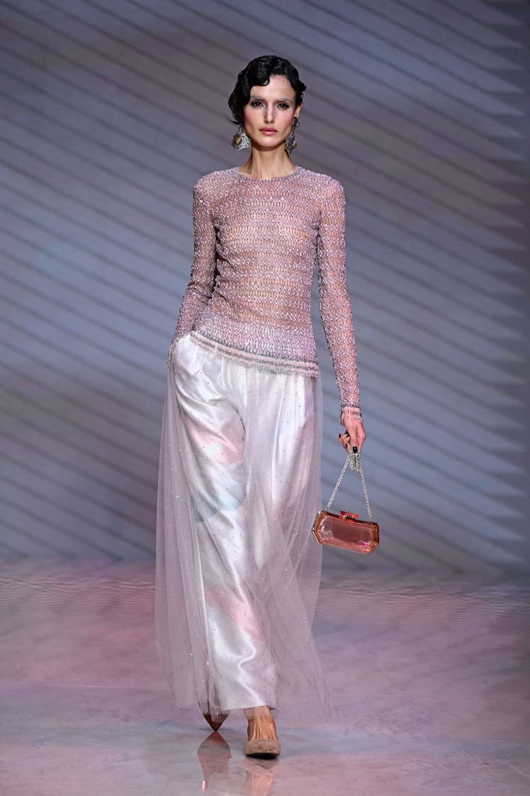A model walks the runway of the Giorgio Armani show during the Milan Fashion Week Womenswear Spring/...