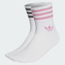 These Adidas socks are part of Poosh's 2023 gift bags. 