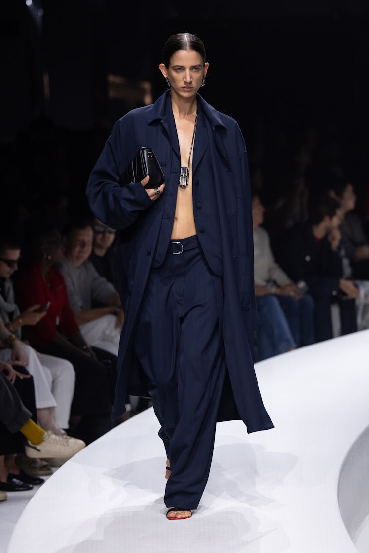 a look from ferrari's runway show at milan fashion week