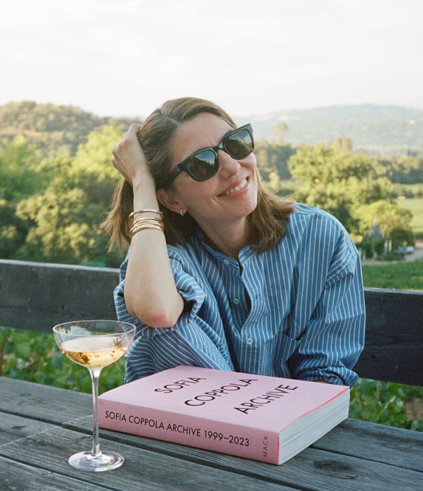 Sofia Coppola sitting with her book, Archive