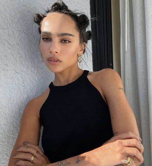 Zoe Kravitz bantu knots on balcony