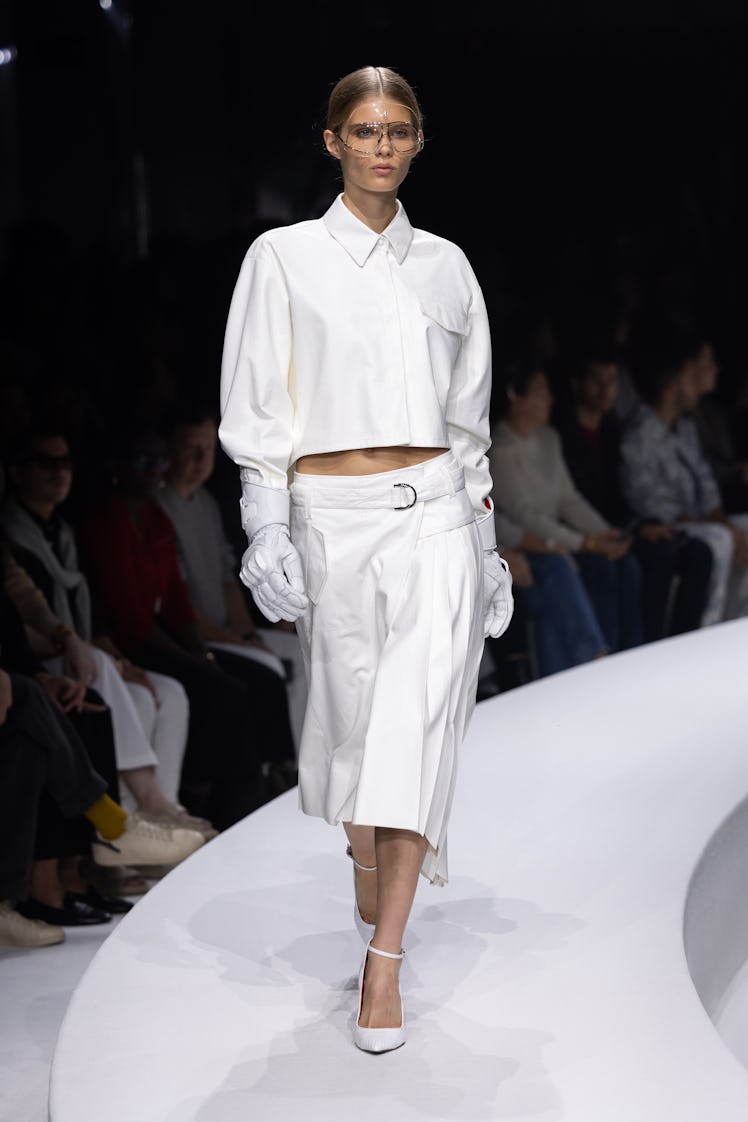 a look from ferrari's runway show at milan fashion week