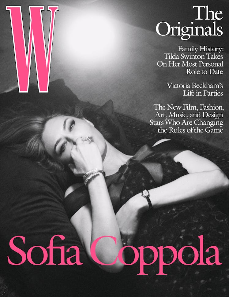 Sofia Coppola wears a Chanel Haute Couture dress; Cartier ring, bracelet, and watch. 