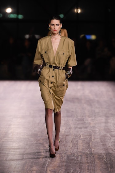 Model on the runway at Saint Laurent Ready To Wear Spring 2024 held at Place Jacques Rueff on Septem...