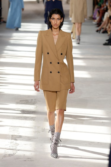 A model walks the runway during the Dries Van Noten Womenswear Spring/Summer 2024 show as part of Pa...