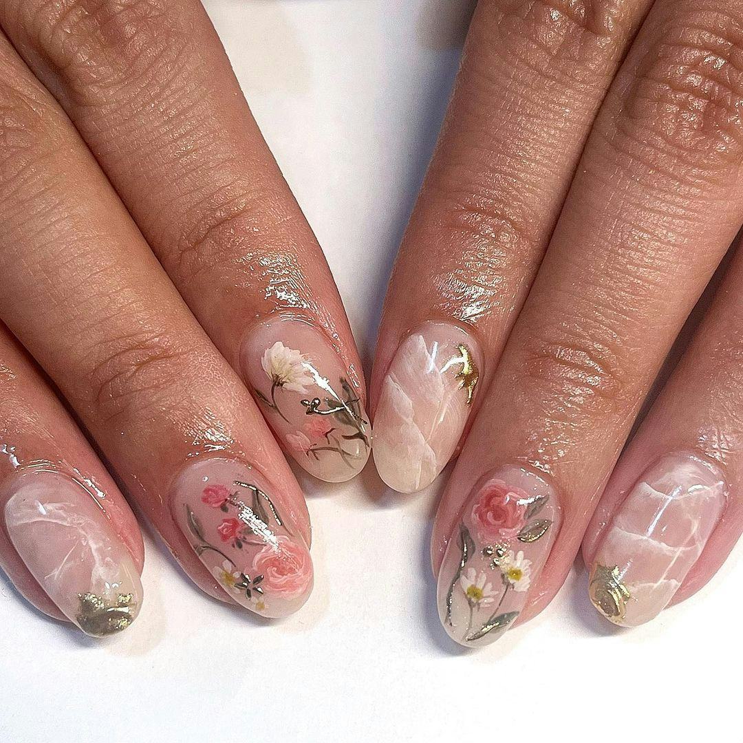 Need a nail art idea for Libra season 2023? Take inspiration from these nude marble nails with flora&hellip;