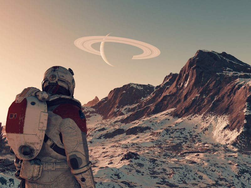 A screenshot from Starfield shows someone looking at a planet in the sky.
