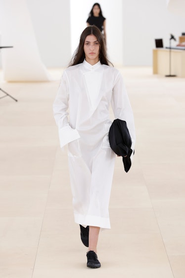 Model on the runway at Issey Miyake Ready To Wear Spring 2024 on September 29, 2023 in Paris, France...