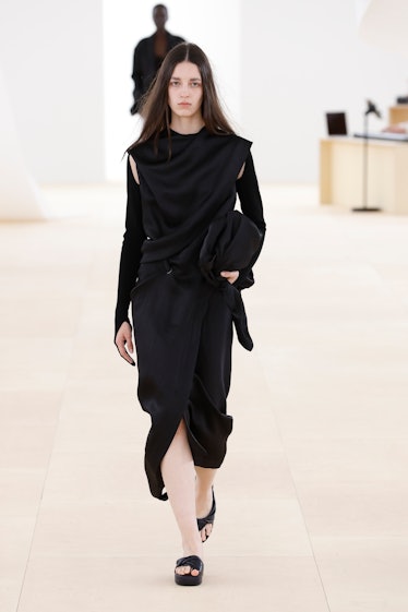 Model on the runway at Issey Miyake Ready To Wear Spring 2024 on September 29, 2023 in Paris, France...