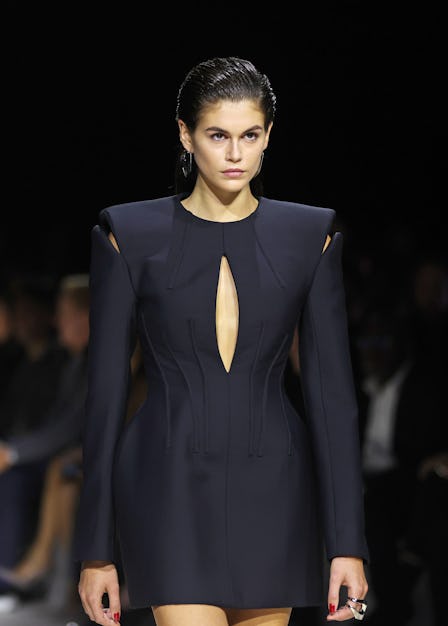 Kaia Gerber walks the runway at the Alexander McQueen SS24 show during Paris Fashion Week at Le Carr...