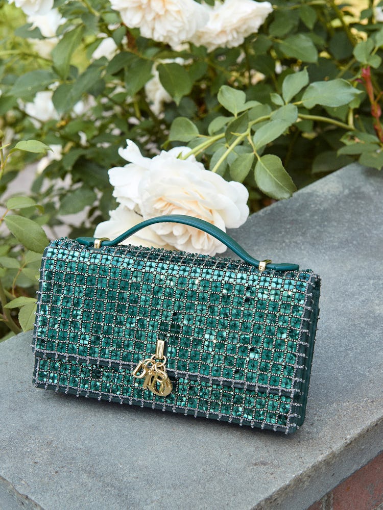 Green embellished textile exterior clutchbag.
