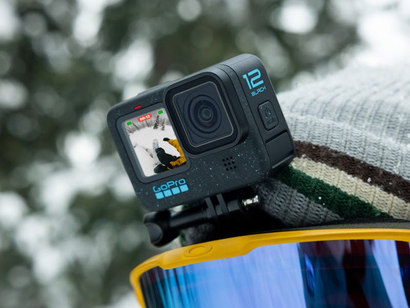 GoPro Hero 12 Black action camera mounted to the head of a snowboarder