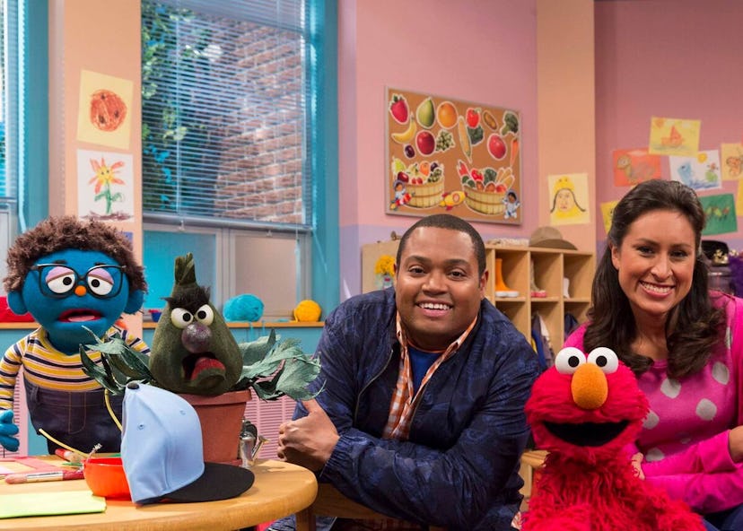 Mrs Sanchez, Chris, Elmo and Stinky in season 45 episode 15 of Sesame Street