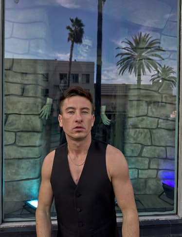 Barry Keoghan wears a Burberry vest; his own necklace. 