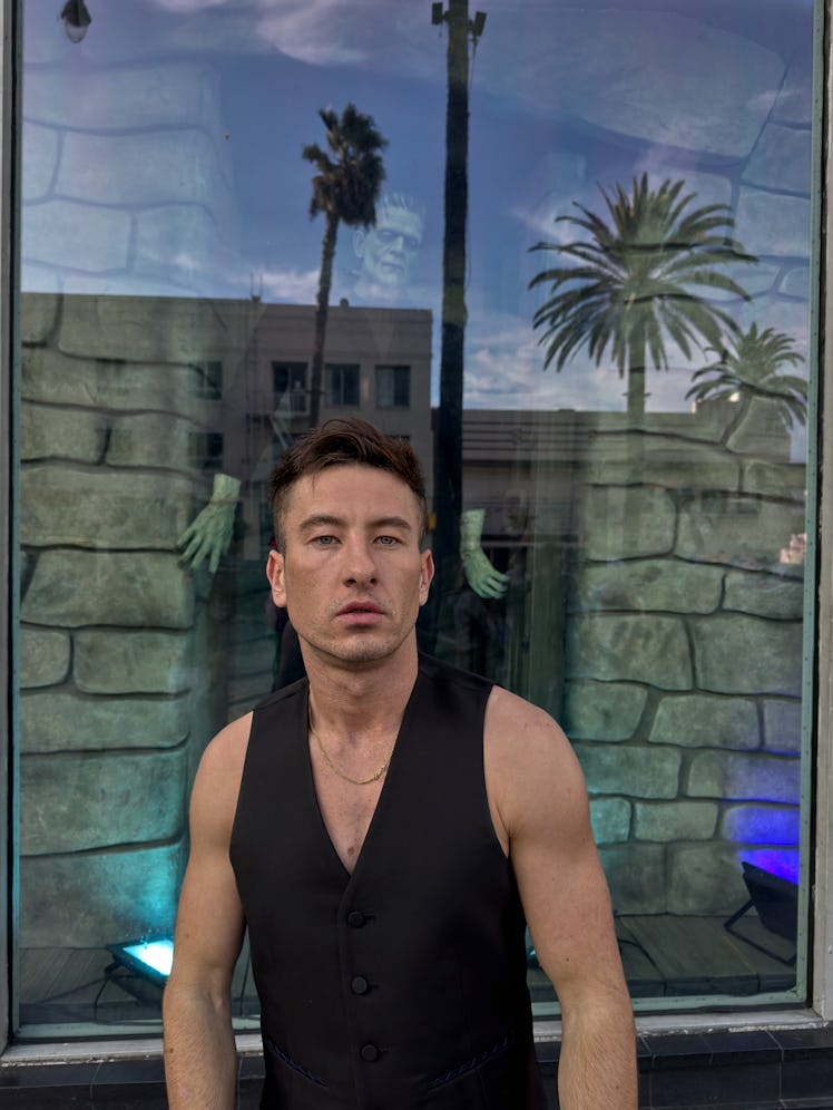 Barry Keoghan wears a Burberry vest; his own necklace.