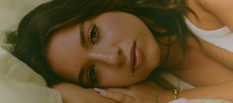 Kenzie's music video for "Face to Face" tackles the dark side of social media.