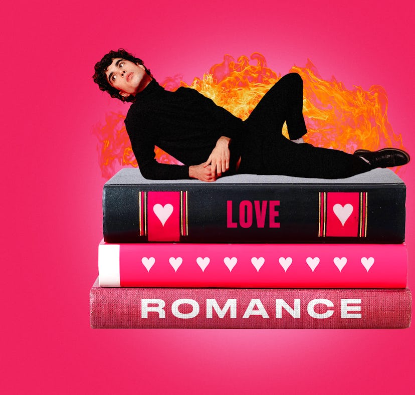 a boy sitting on top of romance books, representing a hot Book Boyfriend that's viral on TikTok