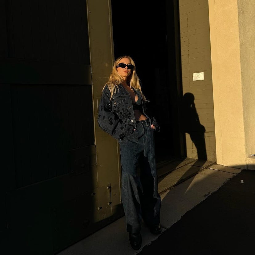 Sydney Sweeney wears a bedazzled denim jacket, jeans, and a denim bra.