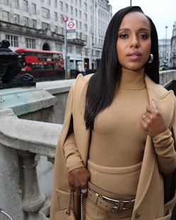 Kerry Washington side parted hair and camel coat