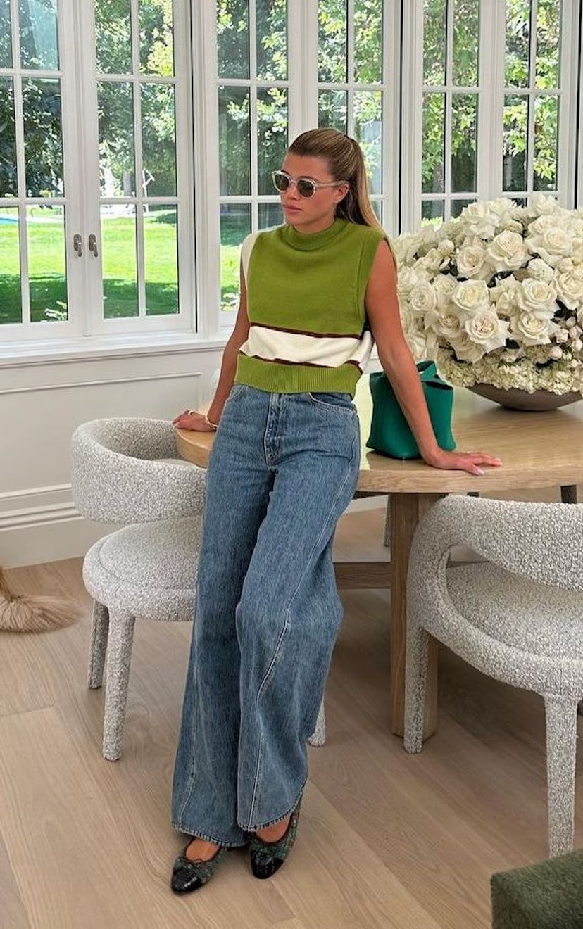 Sofia Richie wears high-waist jeans.
