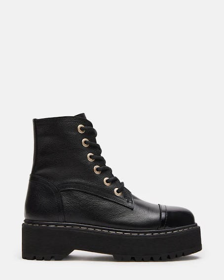 These black combat boots are like Taylor Swift's boots at the Kansas City Chiefs game. 