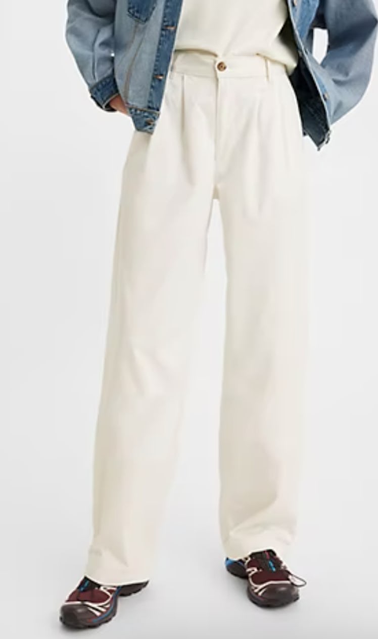 white pleated trousers