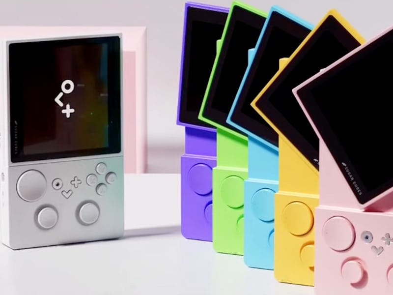 Small Universe X Sugar Cubes gaming handheld with a rotating display