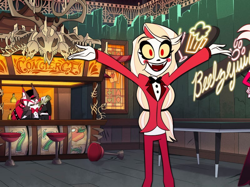 Animated scene with colorful characters in a quirky hotel lobby. A smiling figure with a bow greets ...