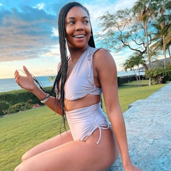 Gabrielle Union side parted braids in bathing suit