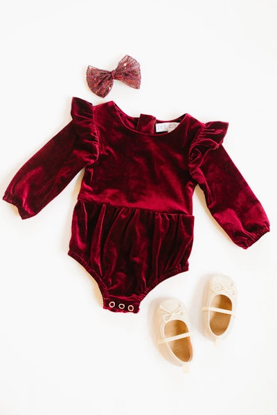 Velvet baby romper in deep red color, a great cold weather baby's first valentine's day outfit.