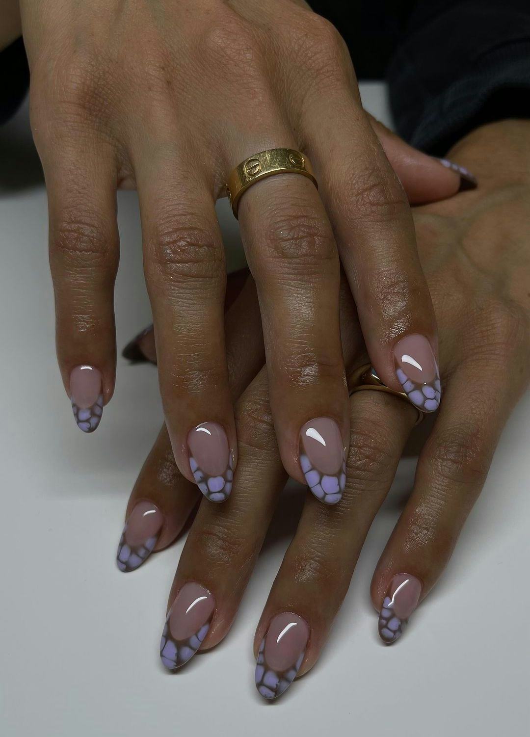 Lavender crocodile printed French tip nails are on-trend for 2024&rsquo;s Aquarius season.