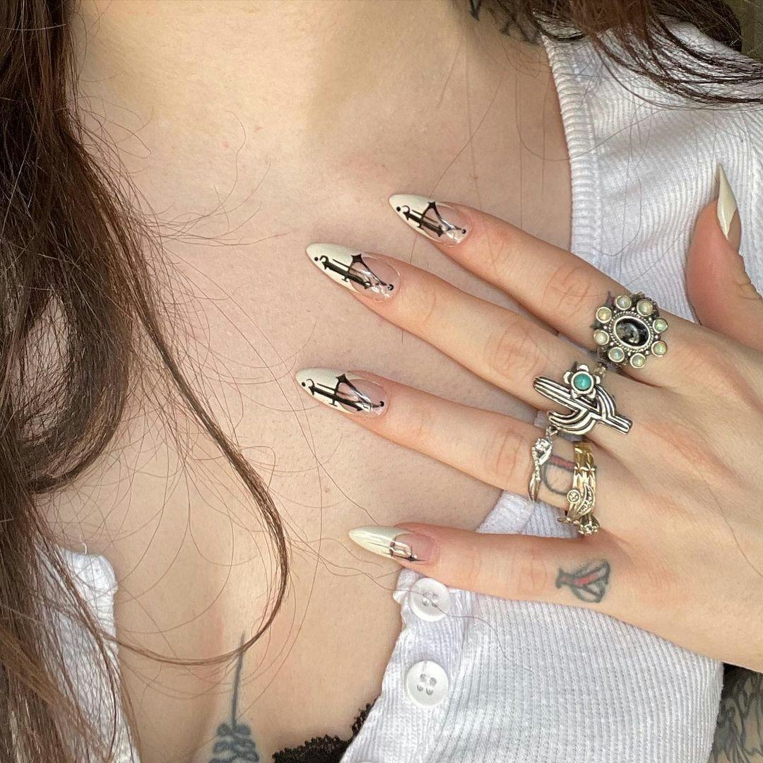 Tattoo-inspired angel number nail art is on-trend for 2024&rsquo;s Aquarius season.