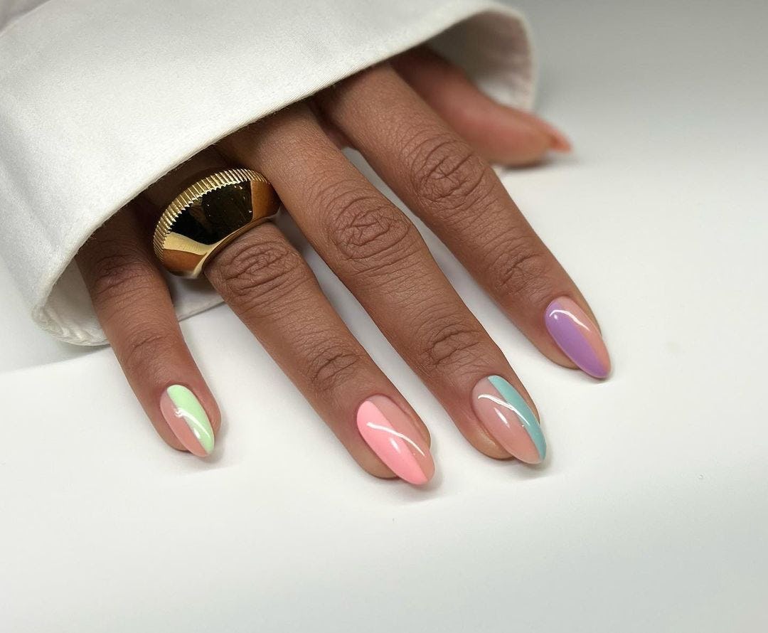 Colorful Skittle nail art is on-trend for 2024&rsquo;s Aquarius season.