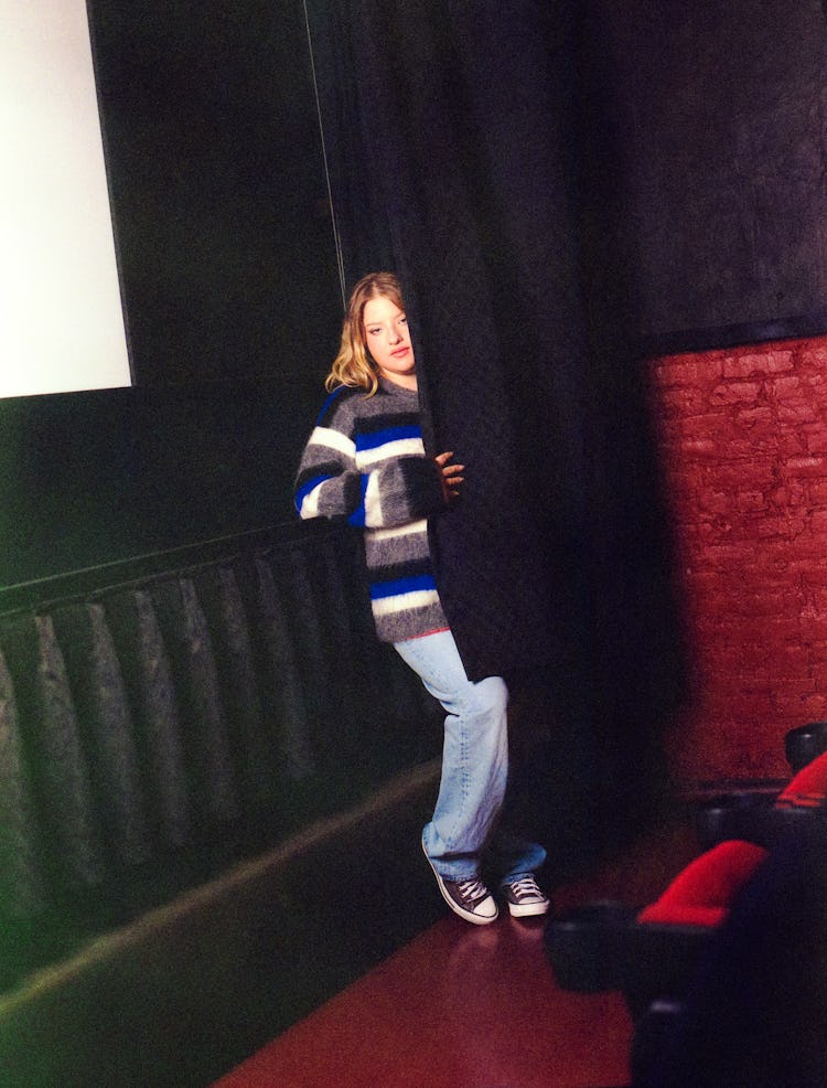 Francesca Scorsese behind the curtain in a movie theater for NYLON's January It Girl shoot