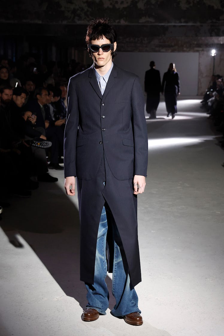 A model walks the runway during the Junya Watanabe Man Menswear Fall/Winter 2024-2025 show as part o...