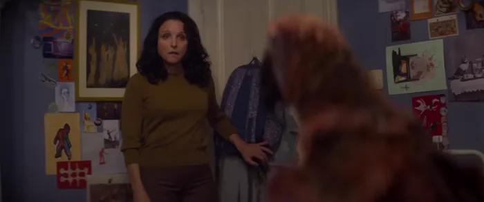 Julia Louis-Dreyfus confronts Death in the form of a parrot.