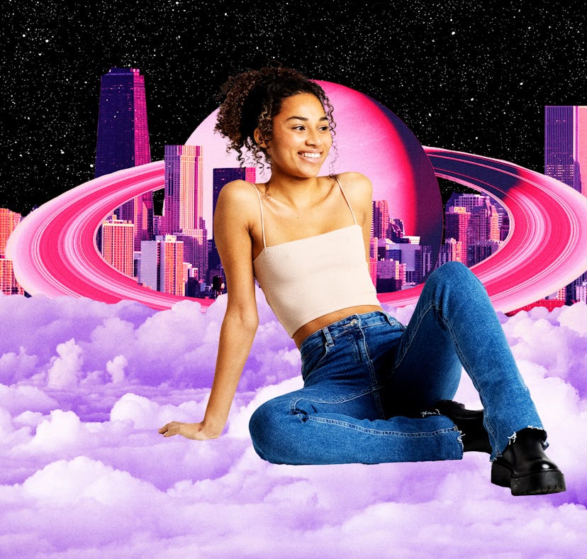 Young woman smiling and chilling on a cloud in front of Saturn after reading her February 2024 horos...