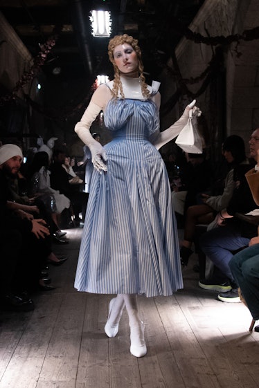 a look from maison margiela by john galliano artisanal couture spring 2024 shown in paris