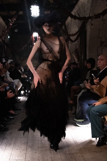 a look from maison margiela artisanal couture collection by john galliano spring 2024