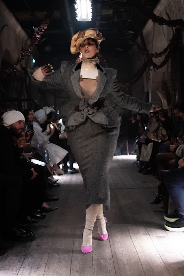 a look from maison margiela by john galliano artisanal couture spring 2024 shown in paris