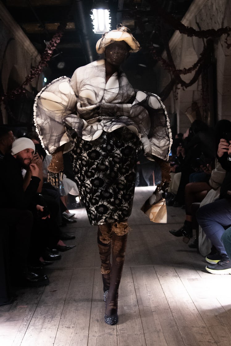 a look from maison margiela artisanal couture collection by john galliano spring 2024