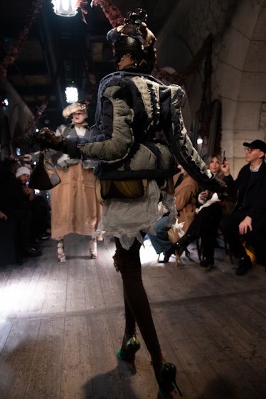 a look from maison margiela by john galliano artisanal couture spring 2024 shown in paris