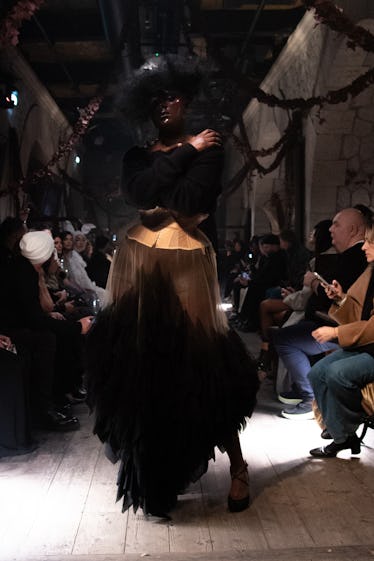 a look from maison margiela artisanal couture collection by john galliano spring 2024