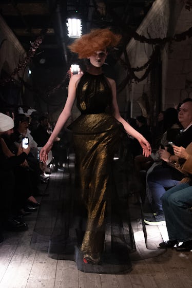 a look from maison margiela artisanal couture collection by john galliano spring 2024