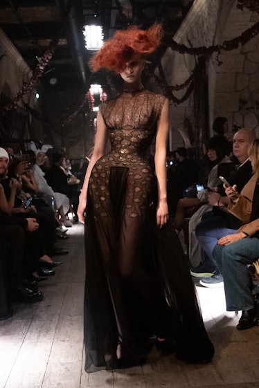 a look from maison margiela artisanal couture collection by john galliano spring 2024