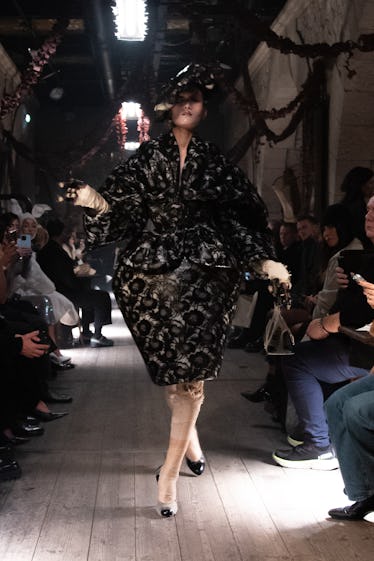 a look from maison margiela artisanal couture collection by john galliano spring 2024