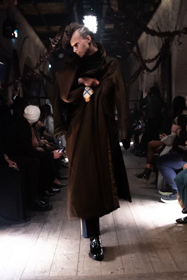 a look from maison margiela artisanal couture collection by john galliano spring 2024