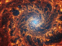 Webb’s image of NGC 628 shows a densely populated face-on spiral galaxy anchored by a central region...